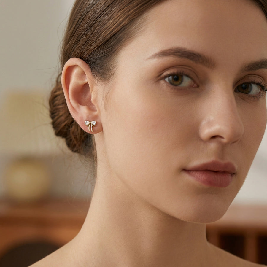 Pear-Cut Bow Stud Earrings – sterling silver earrings, close-up