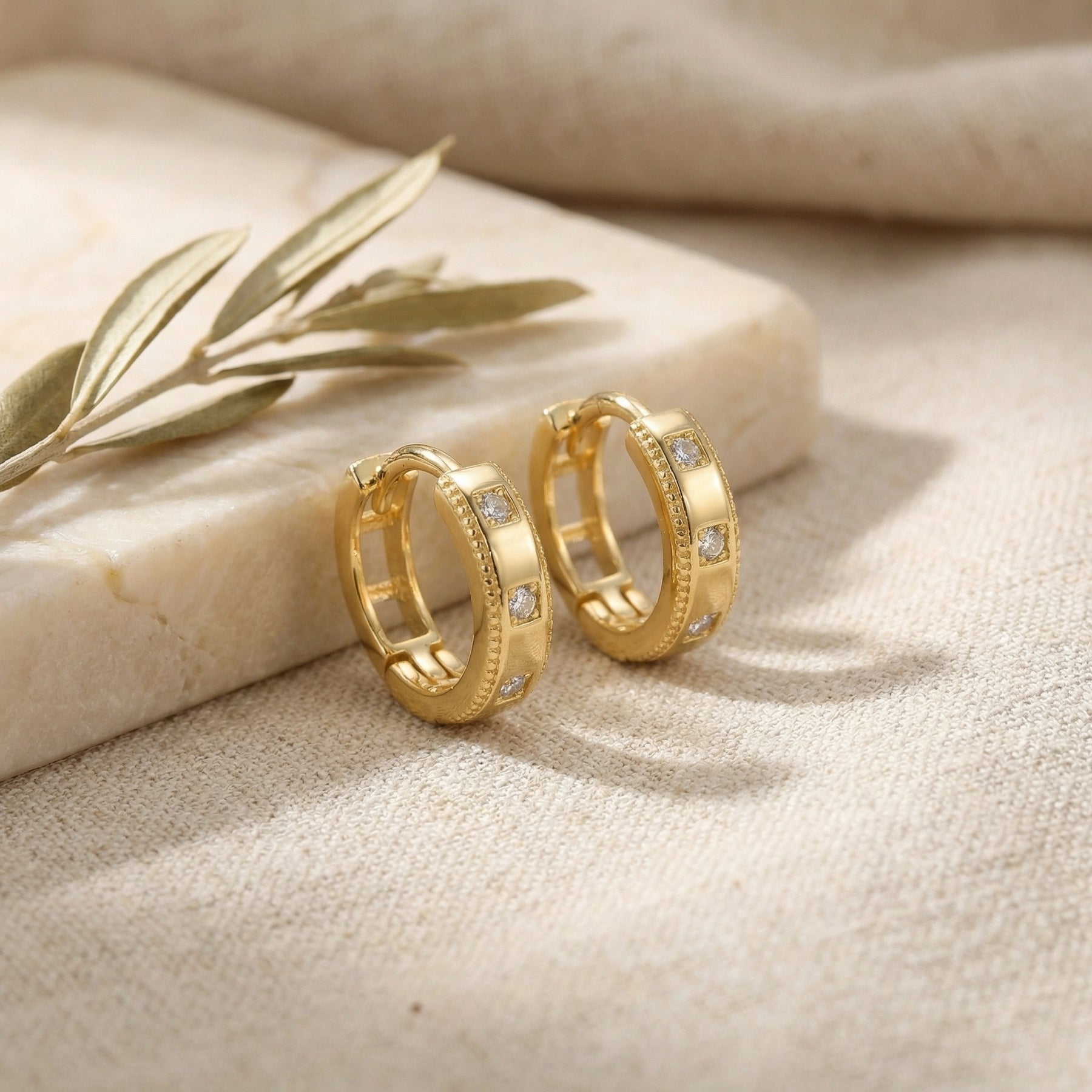Milgrain Detail Huggie Hoop Earrings – sterling silver earrings, close-up