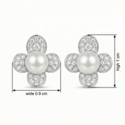 Four-Petal Flower Pearl Studs – pearl earrings, close-up
