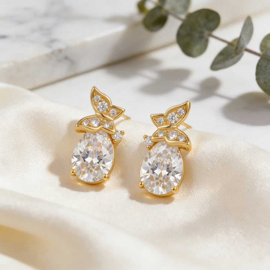 Pear-Shaped CZ Studs with Floral Accents – zircon earrings, front view