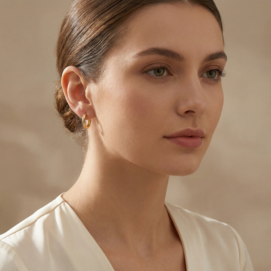 Small Polished Huggie Hoop Earrings – sterling silver earrings, close-up