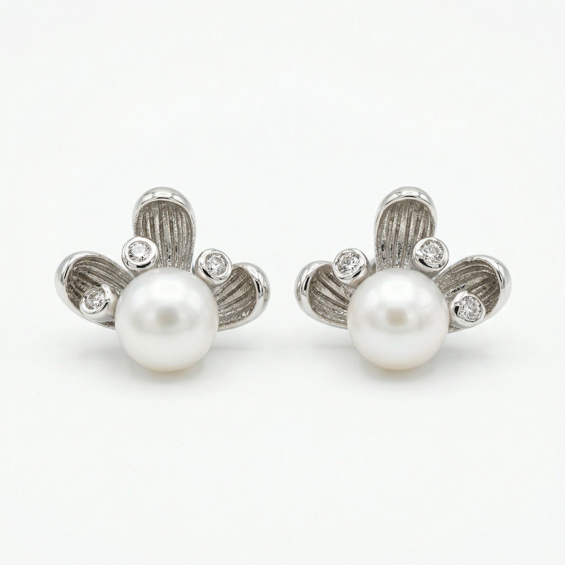 Pearl Studs with Textured Petals – pearl earrings, front view