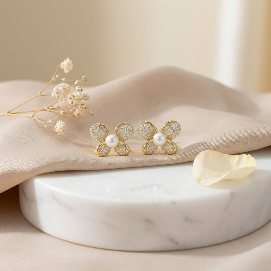Butterfly Studs, Pearl Center – pearl earrings, front view