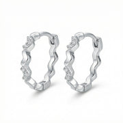Wavy Scalloped Huggie Hoop Earrings – sterling silver earrings, front view