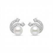 Pearl and Princess-Cut Wave Studs – pearl earrings, styling detail