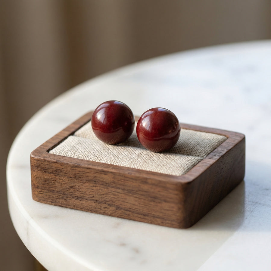 Polished Dark Red Sphere Bead Pair – sterling silver bracelet, side detail