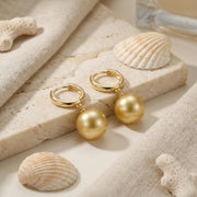 Honey-Toned Pearl Drop Huggie Earrings – pearl earrings, side detail