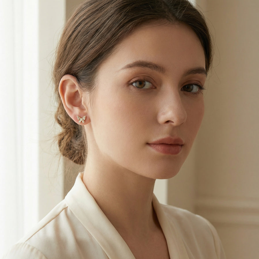 Butterfly Studs, Baguette and Round Cuts – sterling silver earrings, front view