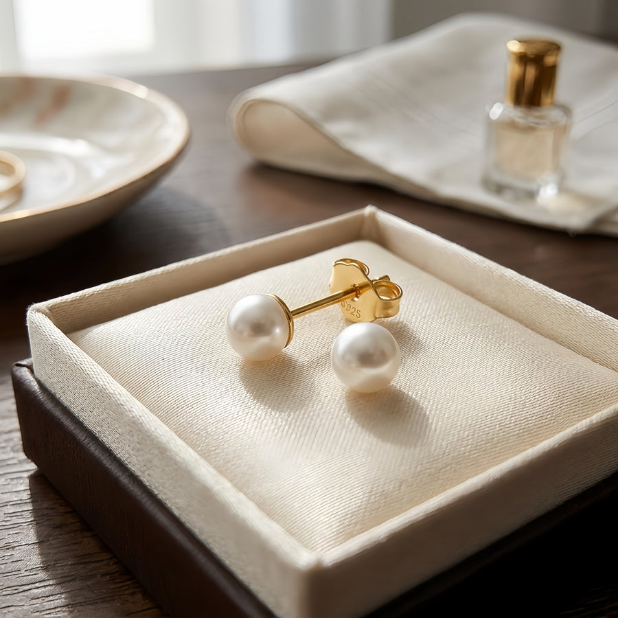 Small White Pearl Studs, Gilded Backs – pearl earrings, front view