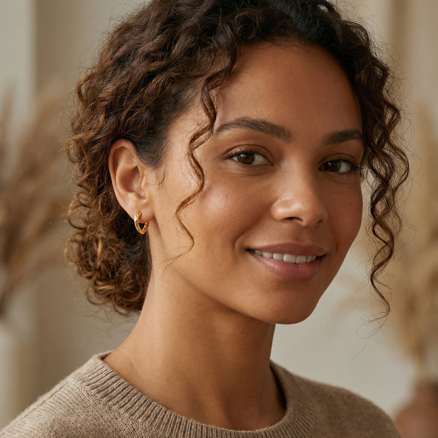 Molten Texture Huggie Hoop Earrings – sterling silver earrings, front view