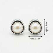 Pearl Studs in Triangular Settings – pearl earrings, front view