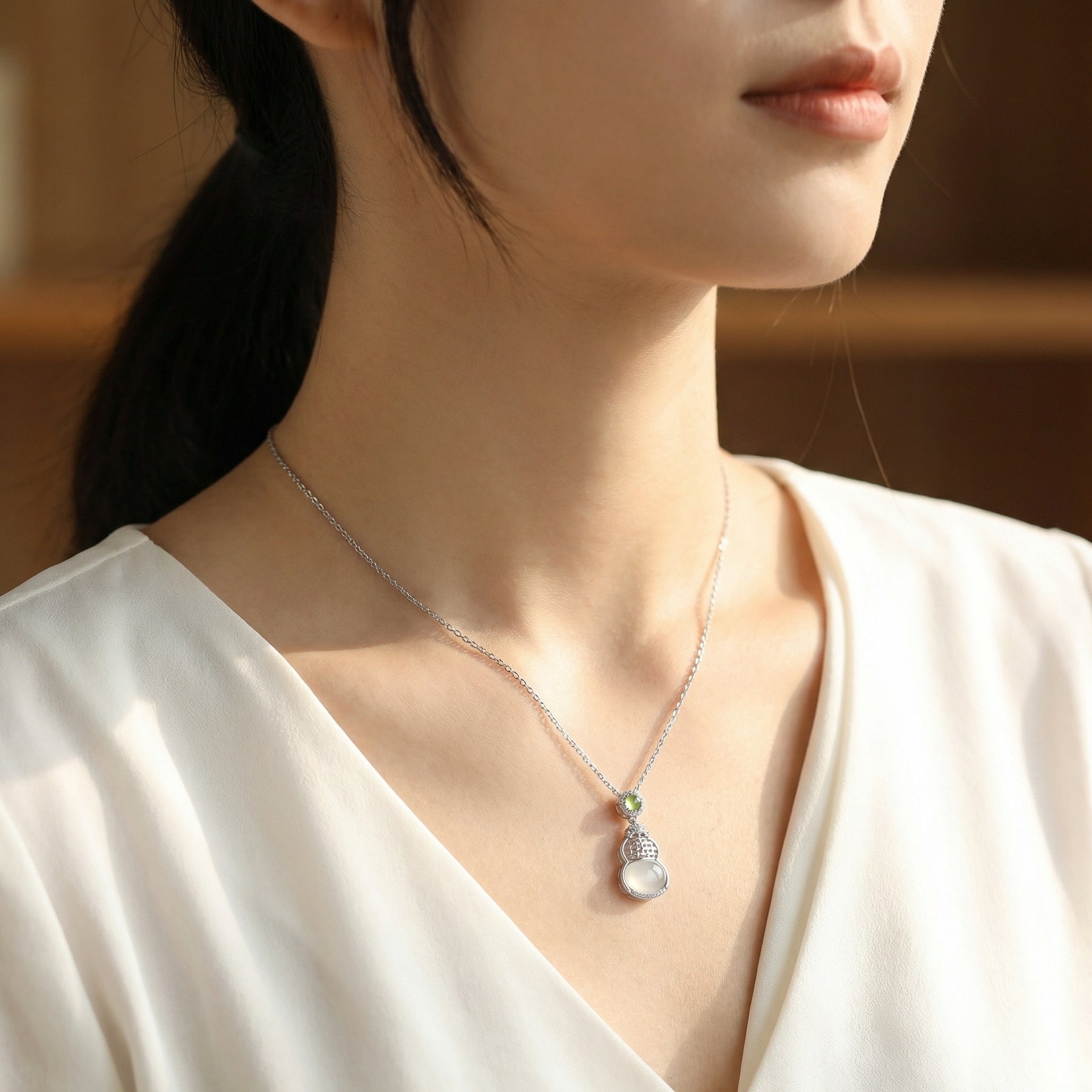 White and Green Hulu Gourd Necklace – sterling silver necklace, front view