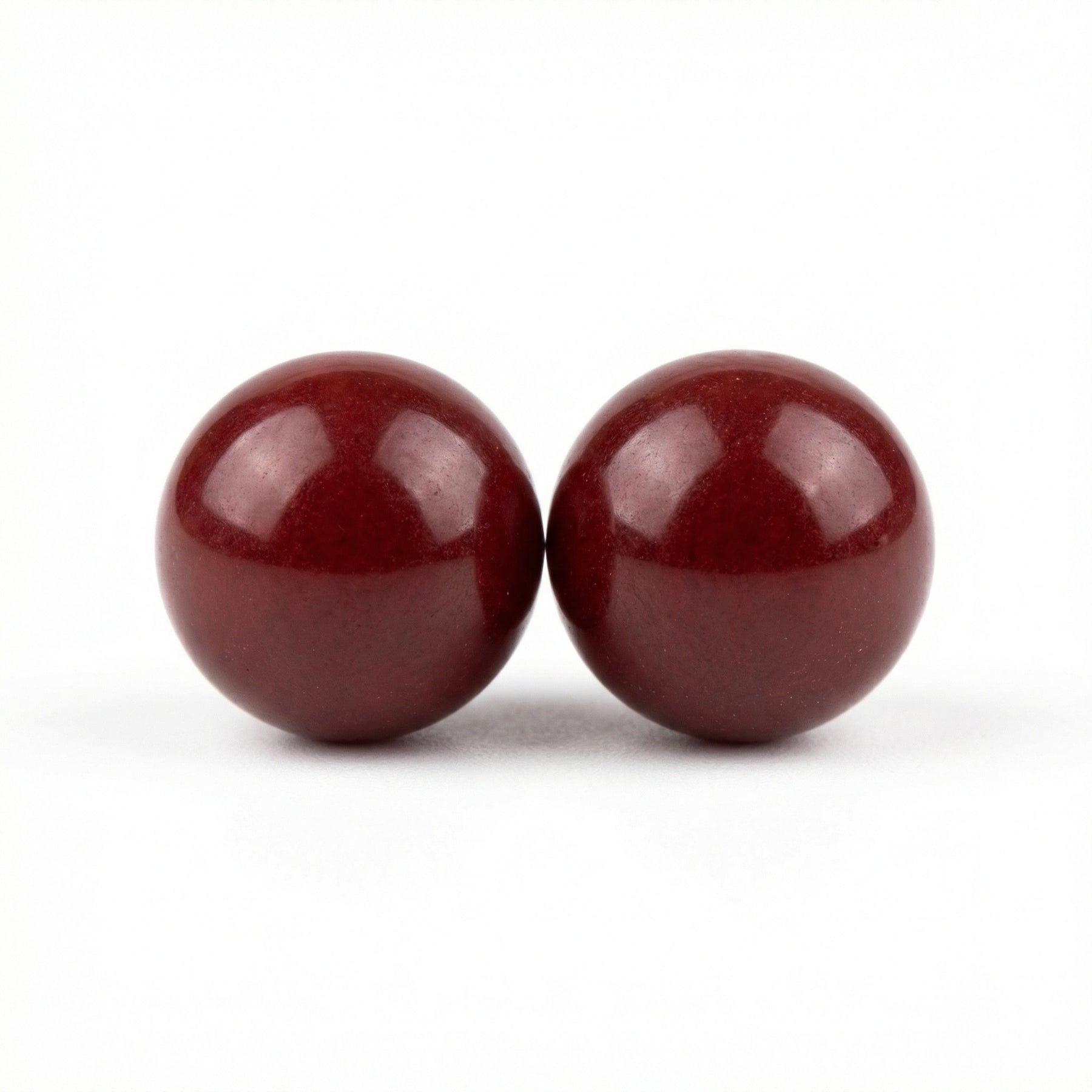 Polished Dark Red Sphere Bead Pair – sterling silver bracelet, front view
