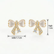 Bowknot Studs with Opal Hearts – opal earrings, close-up