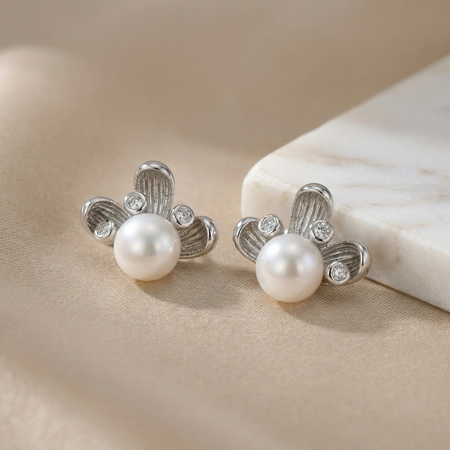 Pearl Studs with Textured Petals – pearl earrings, side detail