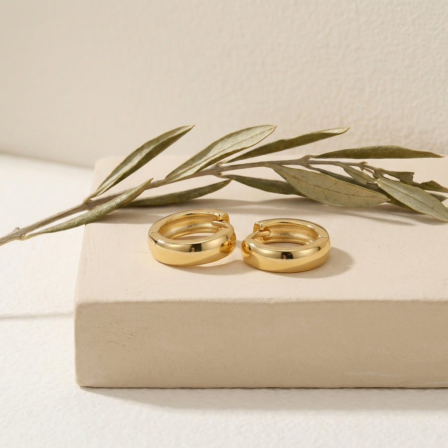 Polished Hoop Huggie Earrings – sterling silver earrings, close-up