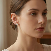 Celestial Star and Oval Stud Earrings – sterling silver earrings, close-up