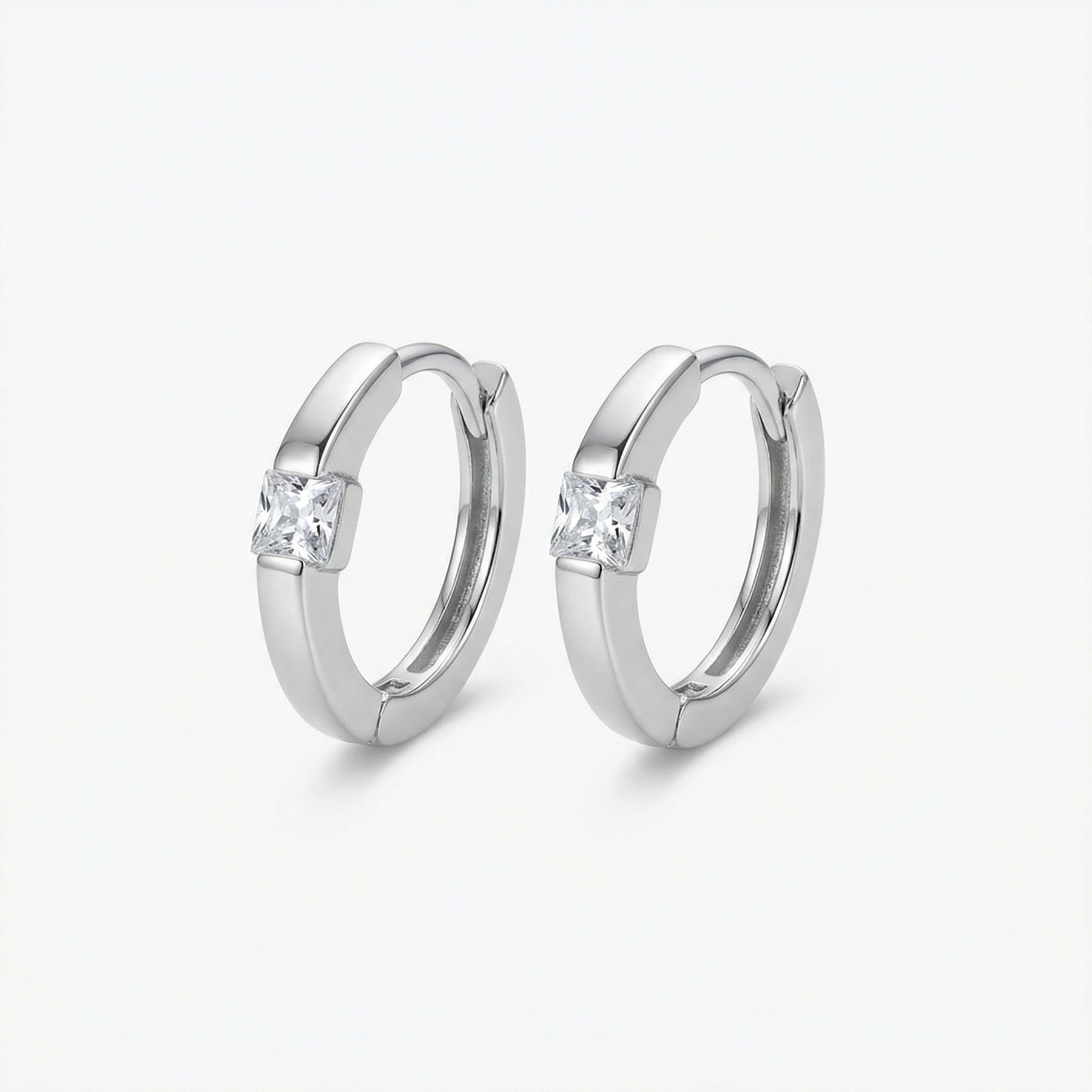 Square-Cut Zirconia Huggie Hoops – zircon earrings, close-up