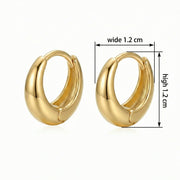 Chunky Polished Huggie Hoop Earrings – sterling silver earrings, close-up